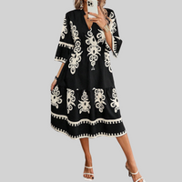 Front view of Anna Boho Geometric Midi Dress in black, showing the overall fit and design