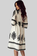 Back view of Anna Embroidered Boho Midi Dress in white, highlighting the back detail